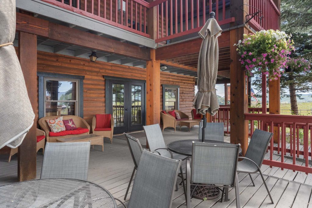 Plenty of outdoor seating and space on multiple decks to enjoy beautiful summers at True North Adventure Lodge